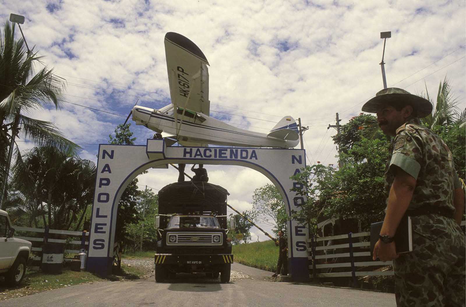 The entrance to the hacienda is decorated with a replica of the Piper airplane, which transported Escobar's first shipment of cocaine to the United States.